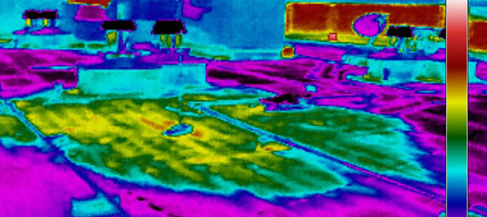 Infrared thermal imaging composite showing building heat signatures